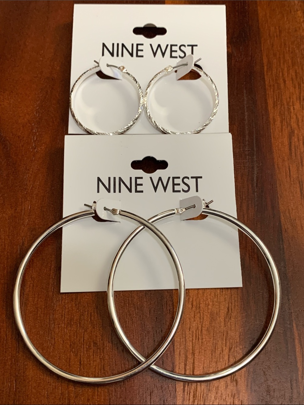 NWT Nine West 2 pair set of silver tone hoop earrings